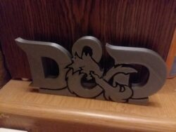 An FDM 3D printed D&D logo made as a personal display piece — because every tabletop space needs a little dragon energy.