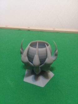 A resin printed dice cup shaped like a dragon’s claw holding a bowl — perfect for tabletop nights.