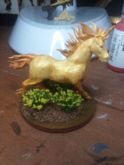 Resin printed unicorn, hand painted and finished with scenic basing by my lovely wife.