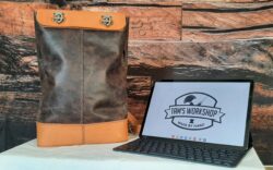 A handmade “Subway” style bag featuring a textured vegetable tanned calf body, Portofino leather accents, and hand stitching with Ritza Tiger Thread.